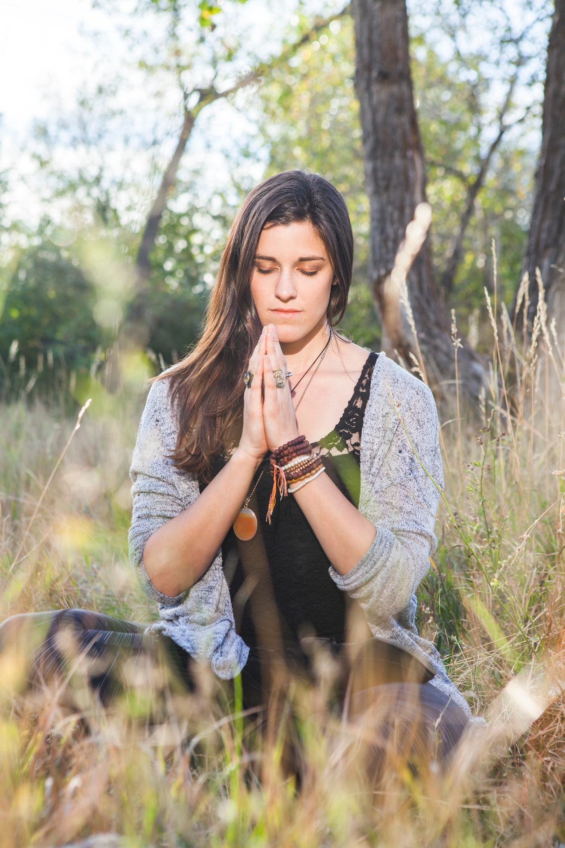 Spiritual Woman Meditating Outside in Nature